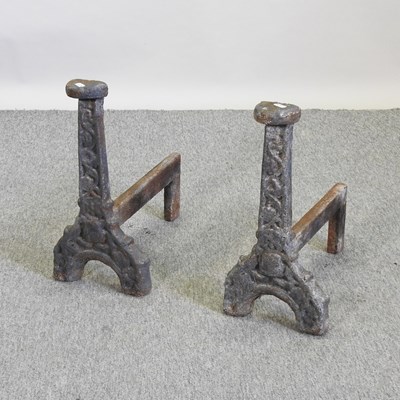 Lot 311 - A pair of cast iron fire dogs