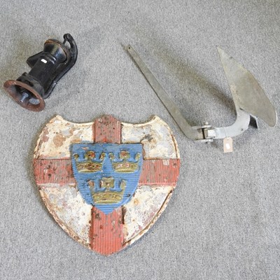 Lot 731 - A shield, pump and anchor