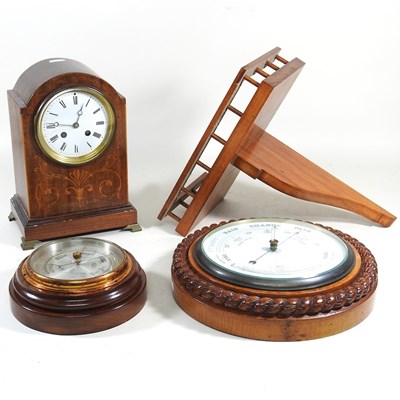 Lot 210 - An Edwardian clock and barometers