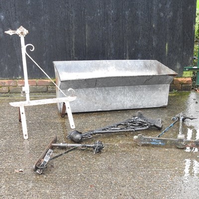 Lot 35 - A galvanised tank, together with various metal brackets