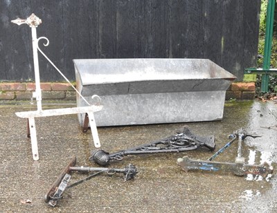 Lot 35 - A galvanised tank, together with various metal brackets