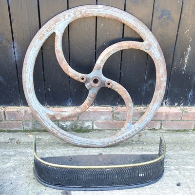 Lot 50 - A cast iron flywheel