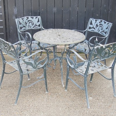 Lot 619 - A green painted metal garden table and chairs