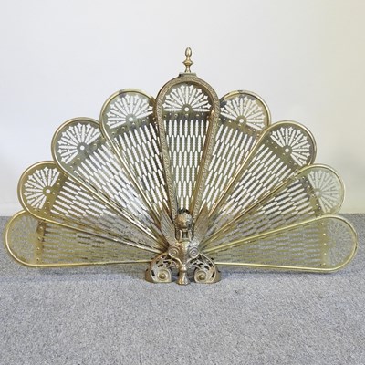 Lot 247 - A brass peacock firescreen