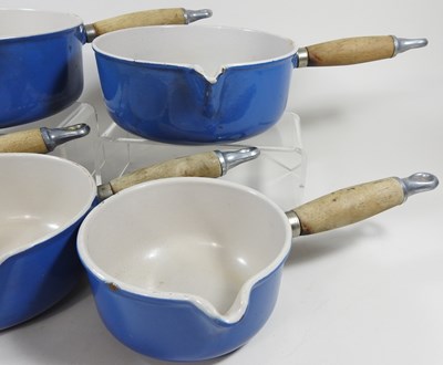 Lot 313 - A set of Le Creuset saucepans