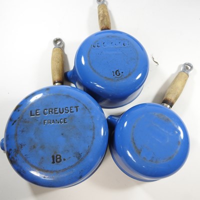 Lot 313 - A set of Le Creuset saucepans