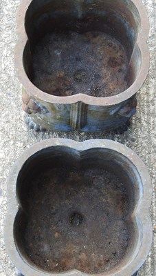 Lot 162 - A pair of small cast iron planters