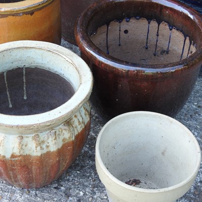 Lot 365 - A collection of glazed garden pots