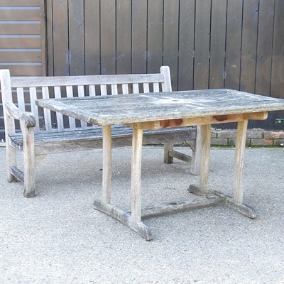 Lot 739 - A garden bench and table