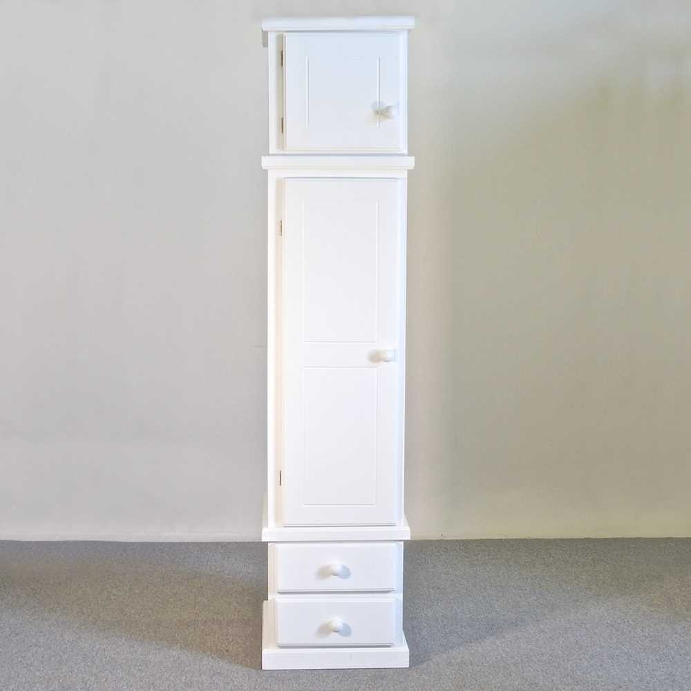 Lot 725 - A modern white painted pine cabinet