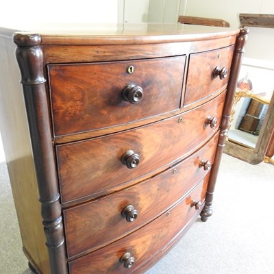 Lot 114 - A 19th century bow front chest