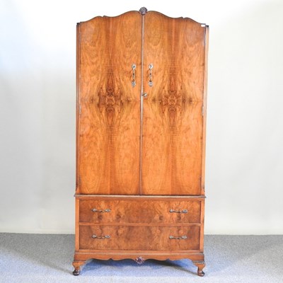 Lot 506 - A 1930's walnut wardrobe