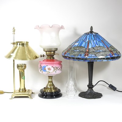 Lot 394 - A Tiffany style table lamp and two lamps