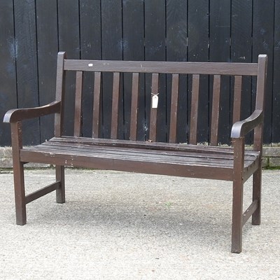 Lot 74 - A brown painted garden bench