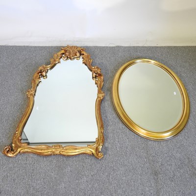 Lot 339 - An ornate gilt framed wall mirror