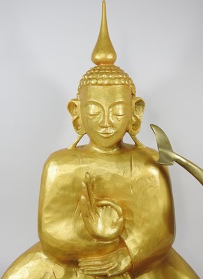 Lot 93 - A gilt painted Buddha