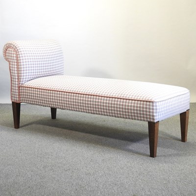 Lot 519 - A drop end check upholstered day bed