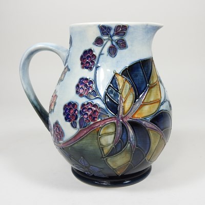 Lot 57 - A Moorcroft Bramble pattern pottery jug,...