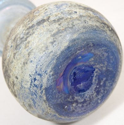 Lot 181 - An iridescent blue glass flask, possibly Roman,...