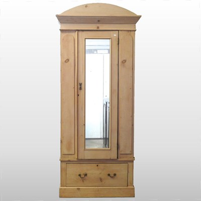 Lot 328 - An antique pine wardrobe