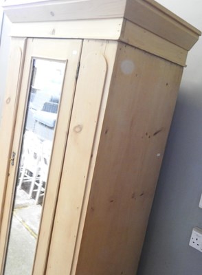 Lot 328 - An antique pine wardrobe