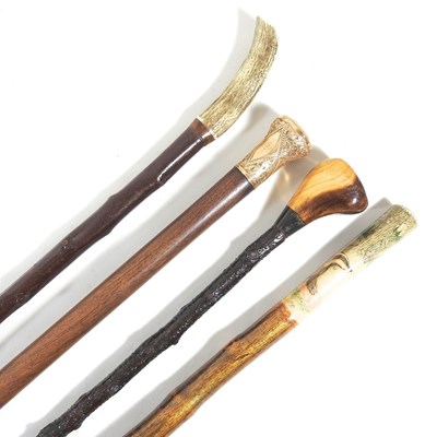 Lot 579 - A collection of walking sticks