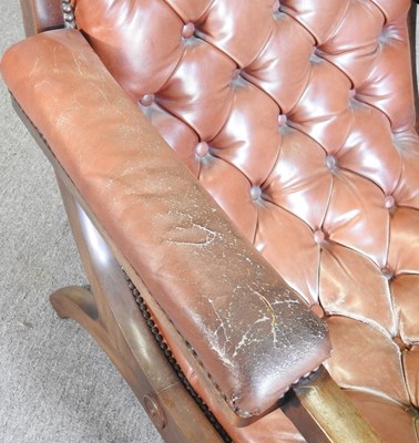 Lot 356 - A leather armchair