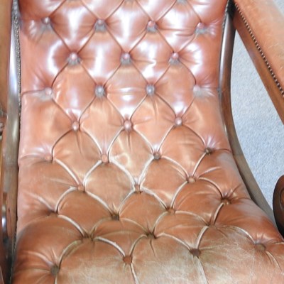 Lot 356 - A leather armchair