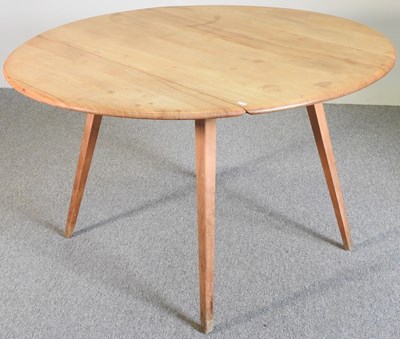 Lot 626 - An Ercol dining table