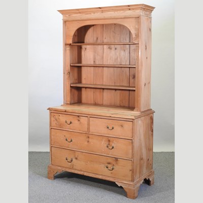 Lot 407 - An antique pine bookcase on chest