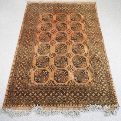 Lot 588 - A Bokhara rug, with three rows of medallions...