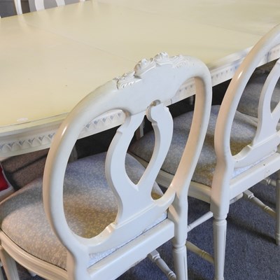Lot 149 - A white painted extending dining table