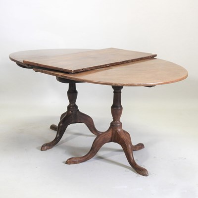 Lot 607 - A 19th century mahogany twin pedestal dining table