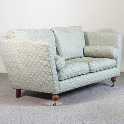 Lot 511 - A Wesley Barrell green knowle sofa