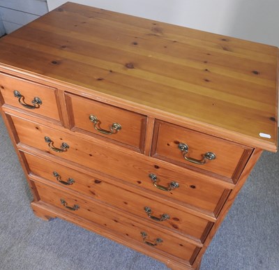 Lot 201 - A pine chest of drawers