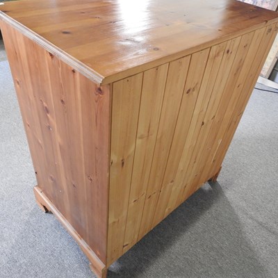 Lot 201 - A pine chest of drawers