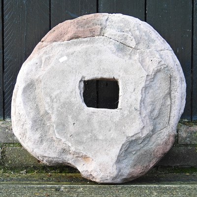 Lot 193 - An old grinding stone