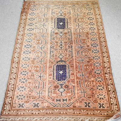 Lot 310 - A Baluchi carpet, with two central lozenges,...