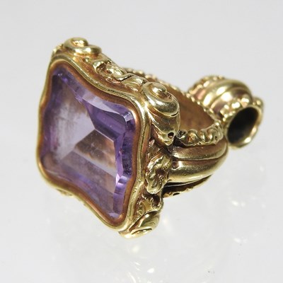 Lot 255 - A 19th century unmarked gilt and amethyst set...