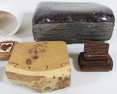Lot 78 - A stone doorstop and wooden items