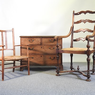 Lot 130 - An oak chest and two chairs