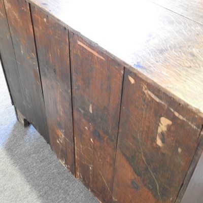 Lot 130 - An oak chest and two chairs