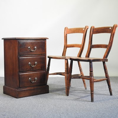Lot 223 - A bedside chest and two chairs