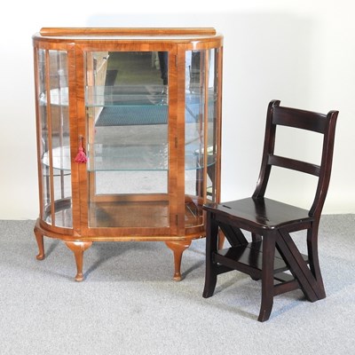 Lot 309 - A cabinet and library chair