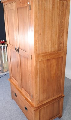 Lot 121 - An oak wardrobe