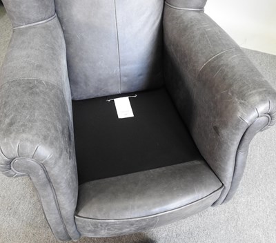 Lot 199 - A grey leather armchair