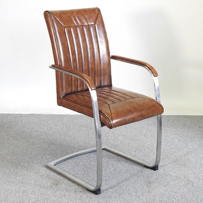 Lot 642 - A modern leather armchair