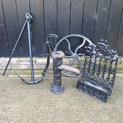 Lot 457 - An anchor, water pump and stand