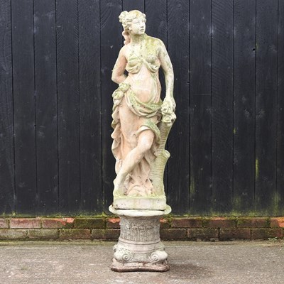 Lot 419 - A reconstituted stone garden statue