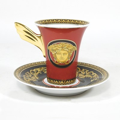 Lot 50 - A Versace porcelain Medusa pattern tea cup and...